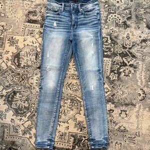 Buckle Light Blue Distressed Skinny Jeans